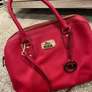 Red Michael Kors tote purse
